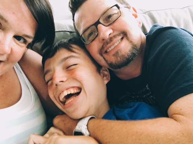 Family Laughing with Autism Son after hyperbaric oxygen therapy